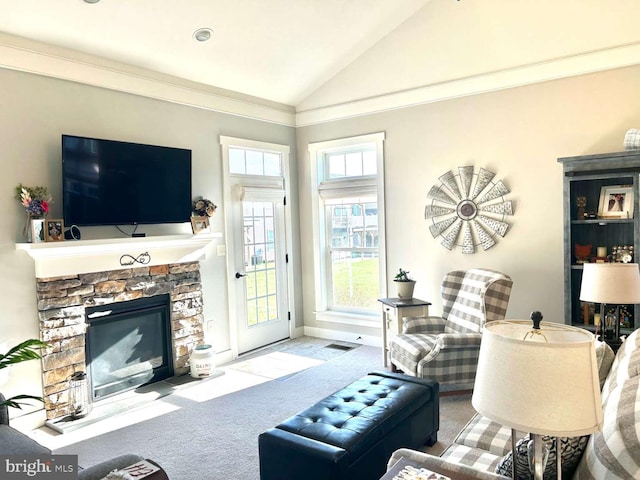 1605 Quincey Dr, Mechanicsburg, PA 17050 - carpeted living area with visible vents, a stone fireplace, vaulted ceiling, and baseboards
