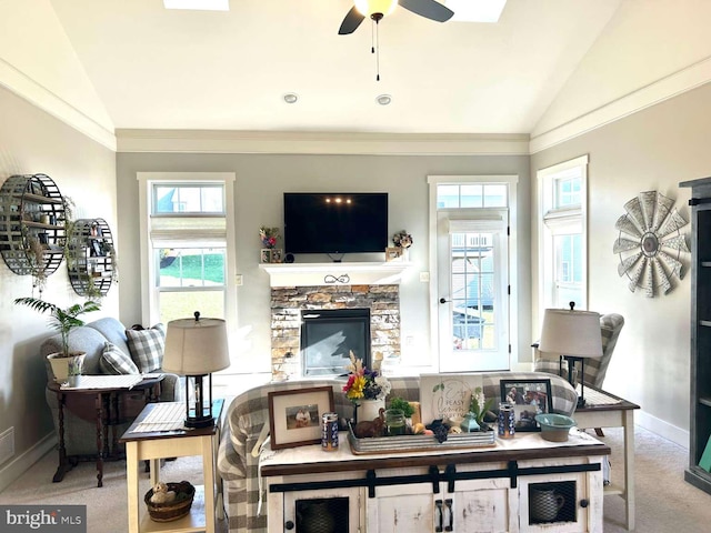 1605 Quincey Dr, Mechanicsburg, PA 17050 - living room with baseboards, a stone fireplace, a ceiling fan, carpet flooring, and lofted ceiling