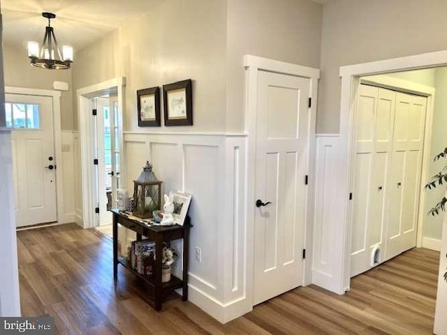 1605 Quincey Dr, Mechanicsburg, PA 17050 - foyer entrance featuring a decorative wall, an inviting chandelier, and wood finished floors