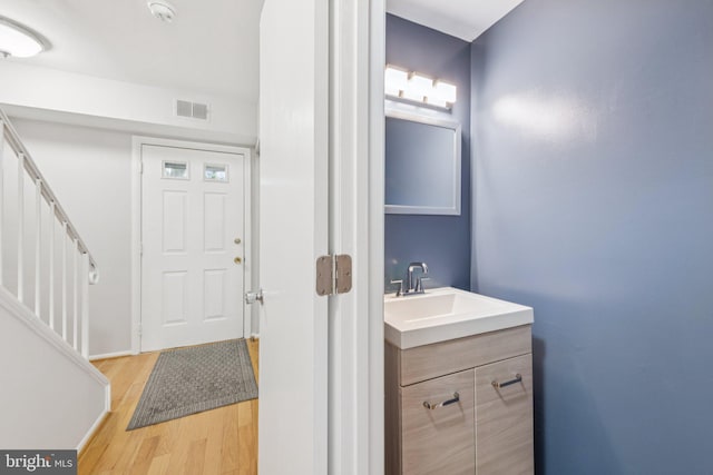 809 Floral Pl NW, Washington, DC 20012 - bathroom with vanity and wood finished floors