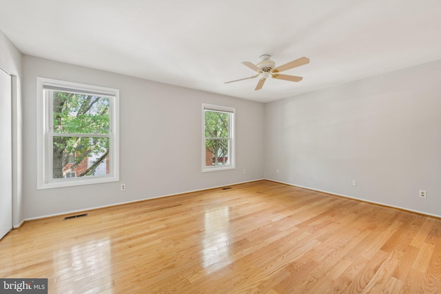 809 Floral Pl NW, Washington, DC 20012 - empty room featuring light wood-type flooring and a ceiling fan
