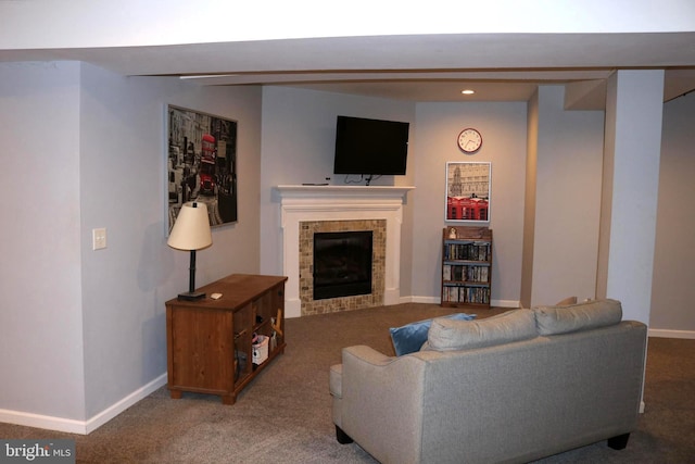 carpeted living area with a tiled fireplace, baseboards, and recessed lighting