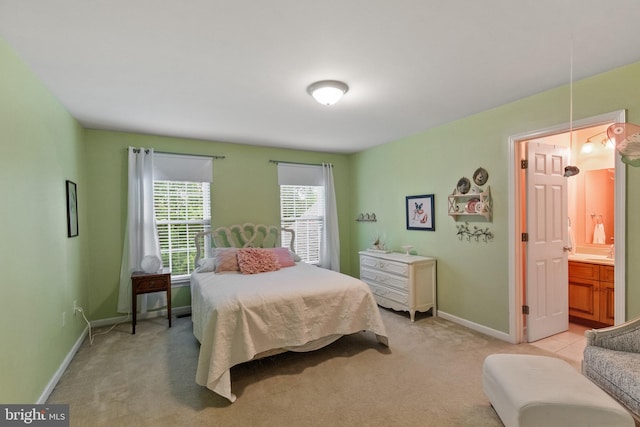 41 Hillview Rd, Morgantown, PA 19543 - bedroom featuring light carpet, baseboards, and ensuite bath