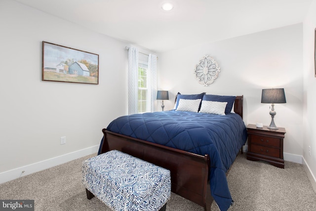 carpeted bedroom with baseboards and recessed lighting