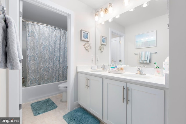 full bath with shower / tub combo with curtain, a sink, double vanity, and toilet