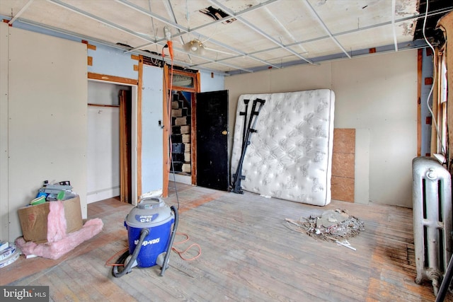 417 N Nichols St, Pottsville, PA 17901 - interior space with radiator and wood finished floors