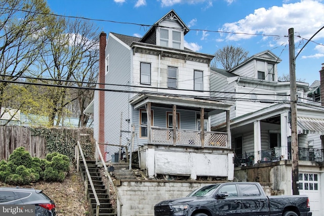 417 N Nichols St, Pottsville, PA 17901 - view of front of home with fence and stairs