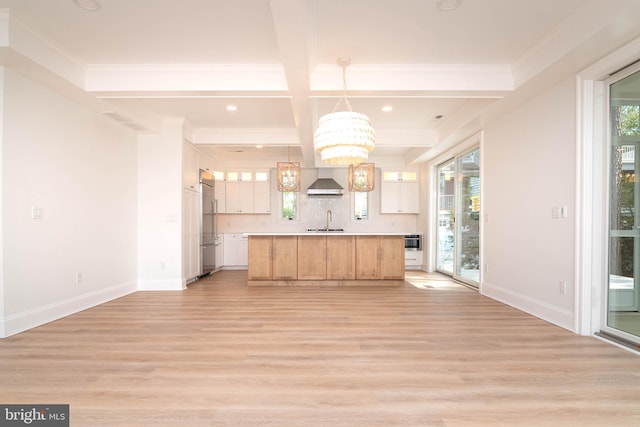 816 Garfield Pkwy, Bethany Beach, DE 19930 - kitchen with built in refrigerator, a chandelier, light wood-style flooring, decorative backsplash, and recessed lighting