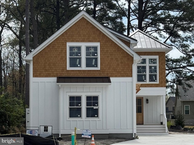 816 Garfield Pkwy, Bethany Beach, DE 19930 - view of front of property featuring a standing seam roof, board and batten siding, and metal roof