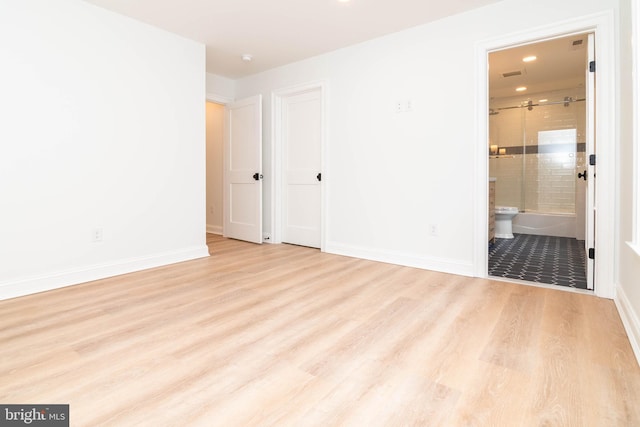 816 Garfield Pkwy, Bethany Beach, DE 19930 - spare room with wood finished floors, recessed lighting, and baseboards