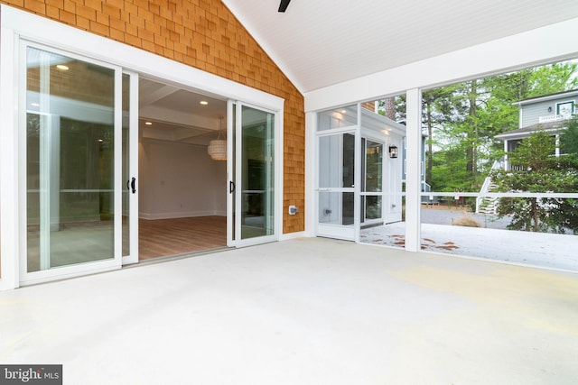 816 Garfield Pkwy, Bethany Beach, DE 19930 - unfurnished sunroom featuring vaulted ceiling
