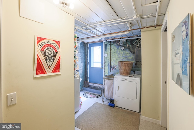 washroom with washer / dryer