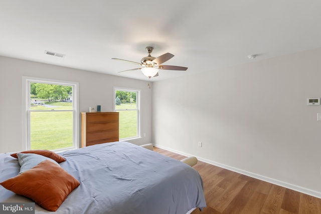 442 Frog Hollow Rd, Winchester, VA 22603 - bedroom with baseboards, wood finished floors, and a ceiling fan