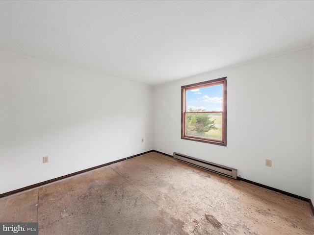 unfurnished room with a baseboard radiator and baseboards