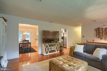 20 Tower Rd, Dillsburg, PA 17019 - living area featuring wood finished floors and a chandelier