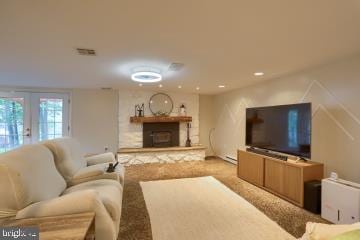 20 Tower Rd, Dillsburg, PA 17019 - carpeted living area with a fireplace with raised hearth and recessed lighting