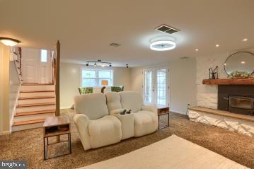 20 Tower Rd, Dillsburg, PA 17019 - living area featuring carpet flooring, stairway, and recessed lighting