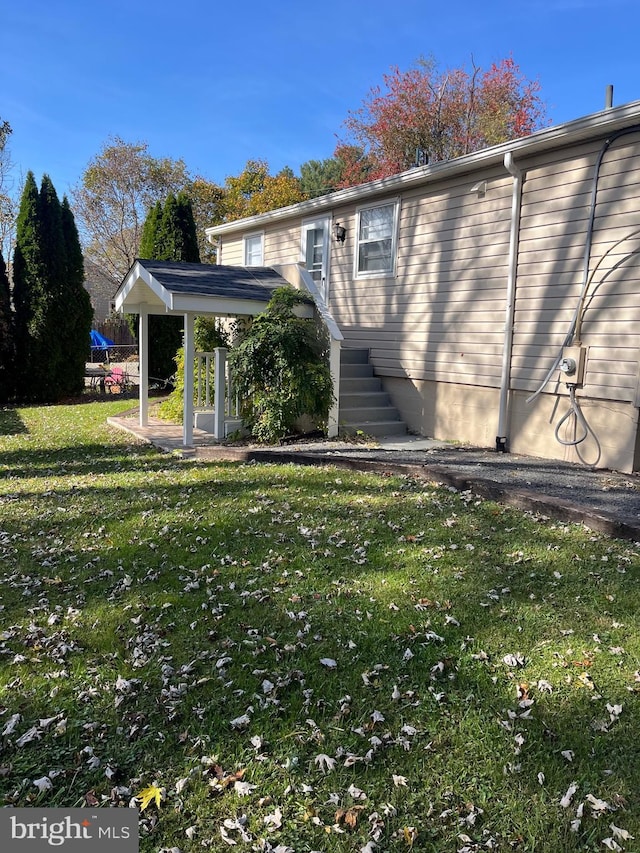 exterior space with a yard