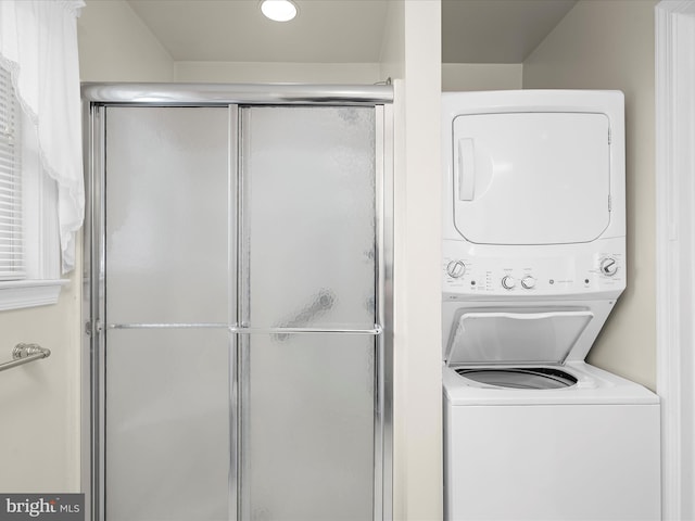 washroom with laundry area and stacked washing maching and dryer