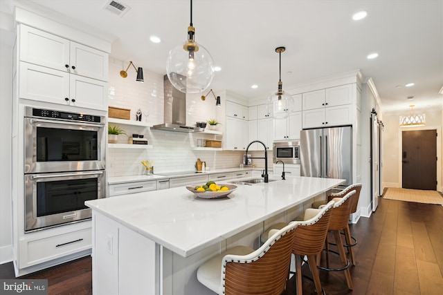 141 W St Unit 304, Annapolis, MD 21401 - kitchen featuring appliances with stainless steel finishes, a sink, backsplash, recessed lighting, and white cabinets