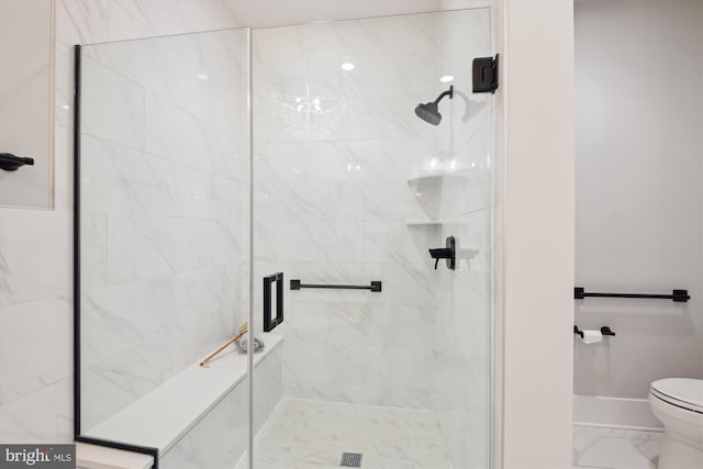 141 W St Unit 304, Annapolis, MD 21401 - bathroom featuring toilet, a shower stall, baseboards, and marble finish floors
