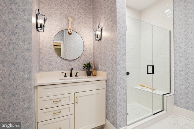 141 W St Unit 304, Annapolis, MD 21401 - bathroom featuring vanity, a shower stall, and marble look tiles