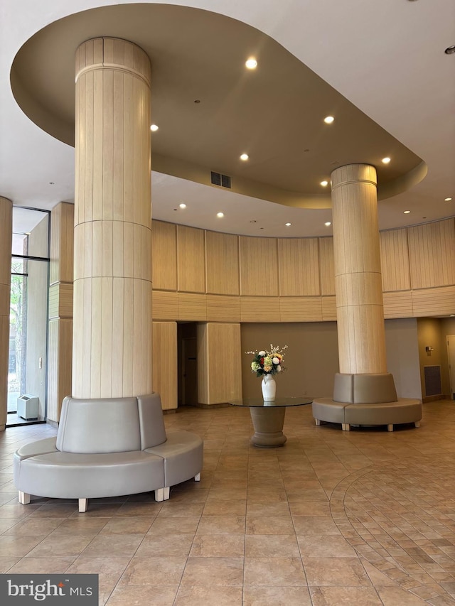 1805 S Crystal Dr S Unit 1109S, Arlington, VA 22202 - community lobby featuring a towering ceiling, a wall of windows, and recessed lighting