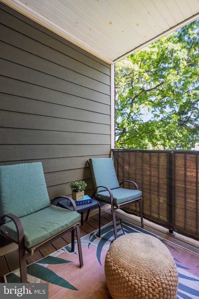view of patio with a balcony