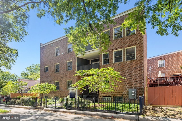 view of property featuring a fenced front yard