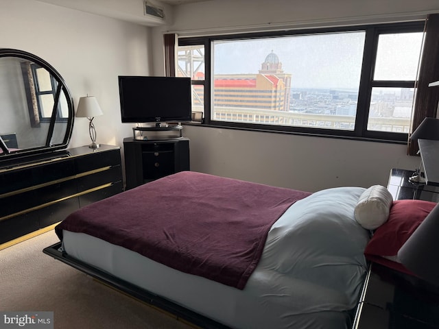 bedroom featuring visible vents