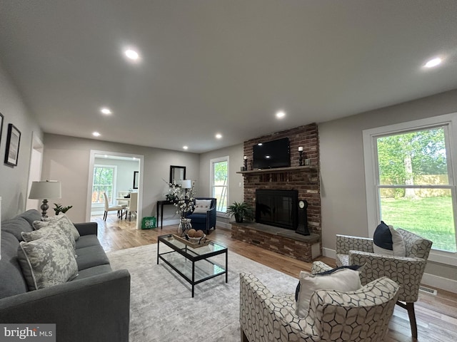 849 Glenn Cir, Wayne, PA 19087 - living room with light wood-style flooring, recessed lighting, a fireplace, and baseboards