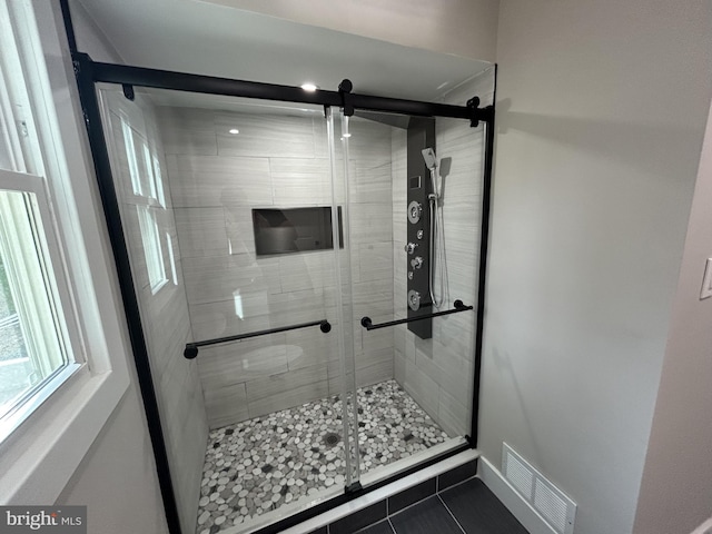 849 Glenn Cir, Wayne, PA 19087 - full bathroom with a shower stall, tile patterned flooring, and baseboards