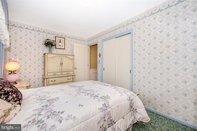 7198 Allegheny Dr, Frederick, MD 21702 - carpeted bedroom featuring baseboards, a closet, and wallpapered walls