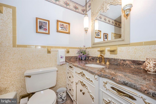 7198 Allegheny Dr, Frederick, MD 21702 - bathroom with toilet, tile walls, and vanity