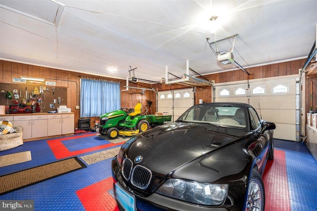 7198 Allegheny Dr, Frederick, MD 21702 - garage with wooden walls and a garage door opener