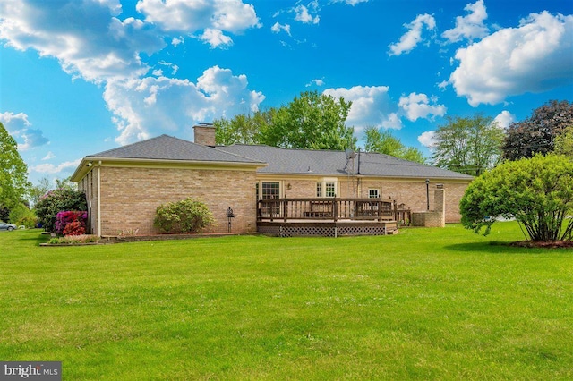 7198 Allegheny Dr, Frederick, MD 21702 - rear view of house featuring a lawn, a wooden deck, a chimney, and brick siding