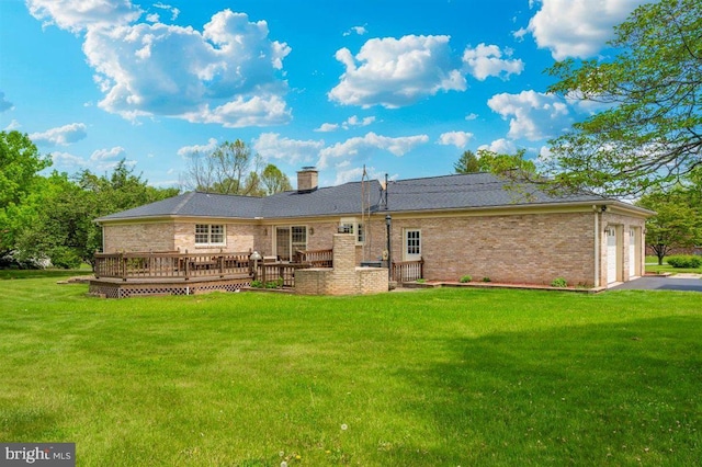7198 Allegheny Dr, Frederick, MD 21702 - back of property featuring a lawn, a chimney, an attached garage, and a deck