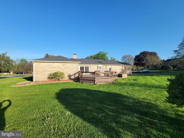 7198 Allegheny Dr, Frederick, MD 21702 - rear view of house with a chimney, a yard, and a deck