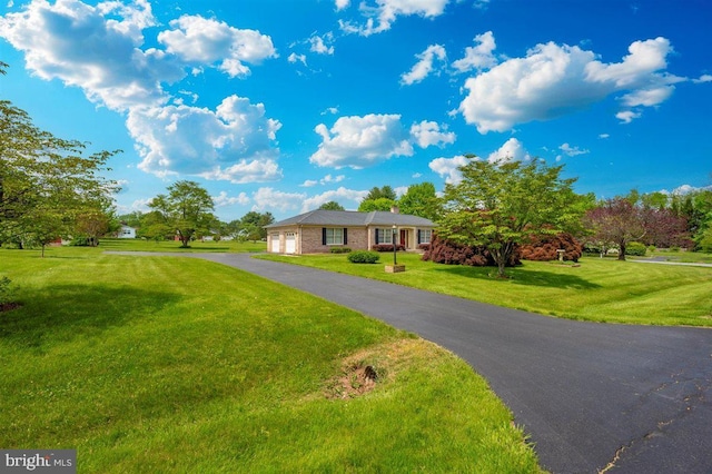 7198 Allegheny Dr, Frederick, MD 21702 - ranch-style house featuring a garage, driveway, and a front yard