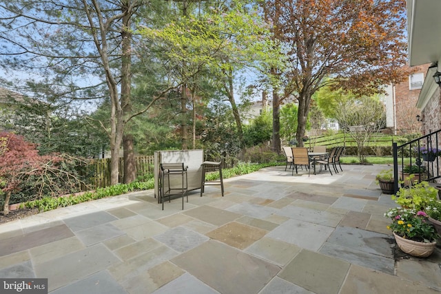 view of patio / terrace with fence and outdoor dining space
