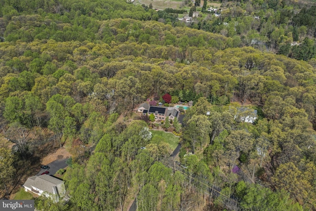 bird's eye view featuring a view of trees