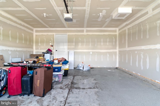 garage featuring a garage door opener