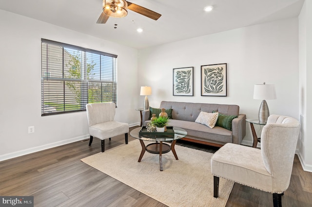 living area featuring recessed lighting, baseboards, a ceiling fan, and wood finished floors