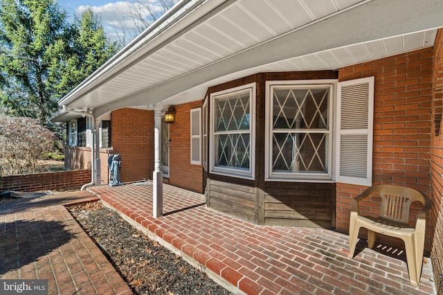 view of patio featuring a porch
