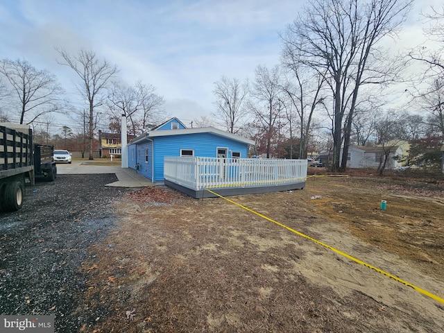 view of yard with a wooden deck