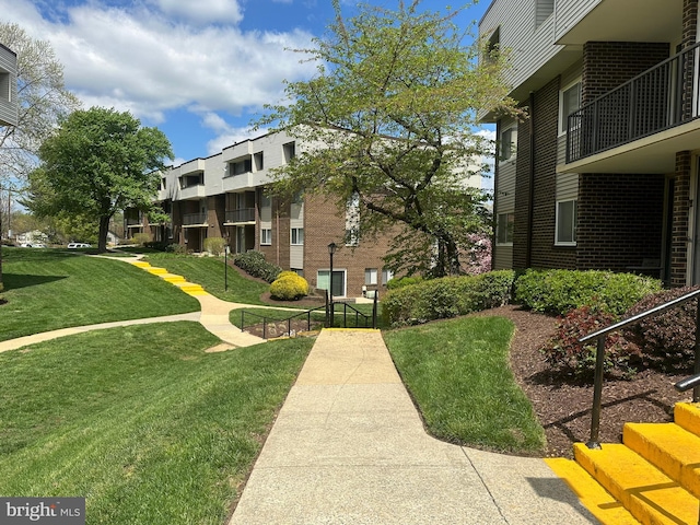 10206 Prince Pl Unit 4-204, Upper Marlboro, MD 20774 - view of property's community with a lawn