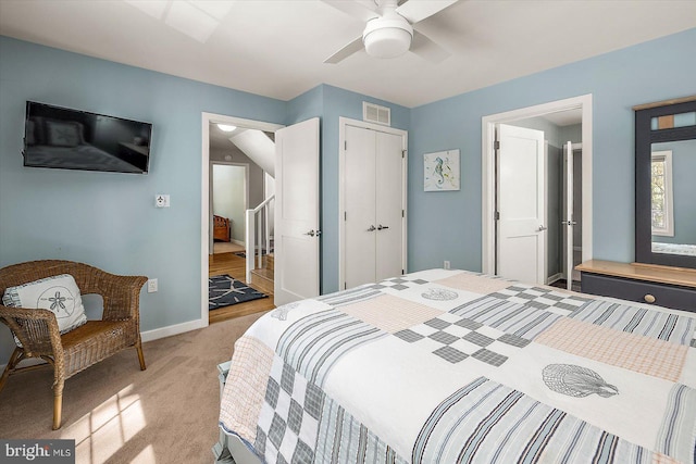 bedroom with a ceiling fan, a closet, light carpet, baseboards, and visible vents