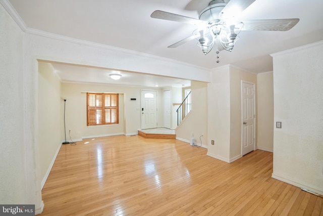 24 Long Green Ct, Silver Spring, MD 20906 - interior space featuring light wood finished floors, baseboards, a ceiling fan, stairs, and crown molding