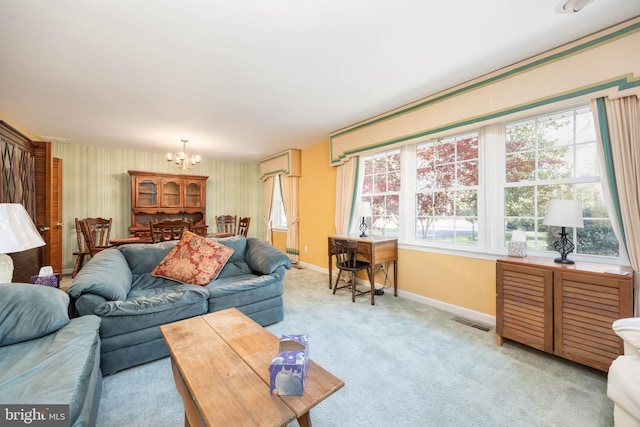 1036 S Schumaker Dr, Salisbury, MD 21804 - living room featuring carpet flooring, visible vents, baseboards, an inviting chandelier, and wallpapered walls