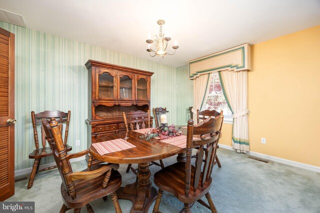 1036 S Schumaker Dr, Salisbury, MD 21804 - carpeted dining room featuring wallpapered walls, baseboards, visible vents, and a notable chandelier